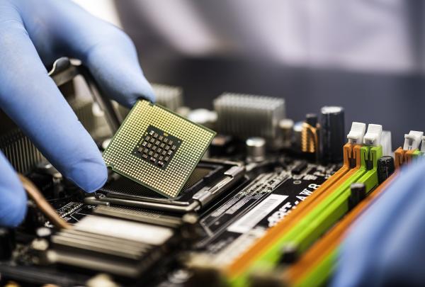 Chip being put into a motherboard