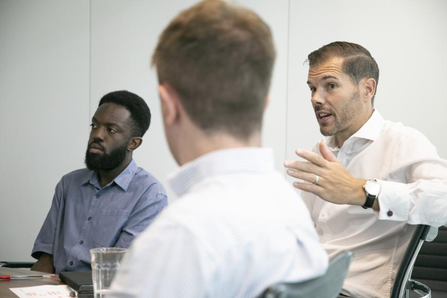 Neil in meeting