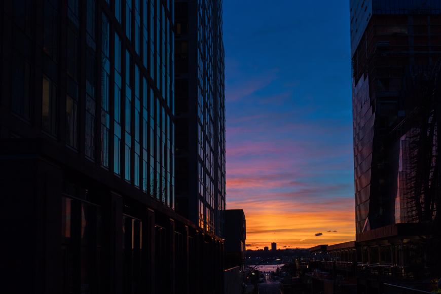 Sunset in gap between buildings