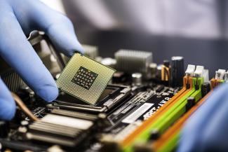 Chip being put into a motherboard