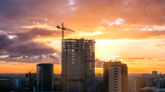 Cranes against high rise blocks