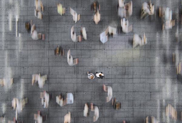 Birdseye view of people walking in street